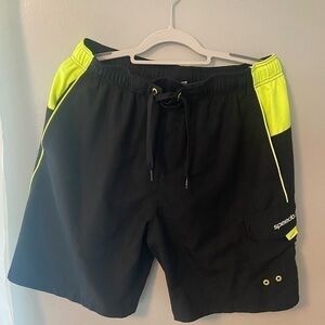Mens Speedo large black with fluorescent green on pockets and drawstring .